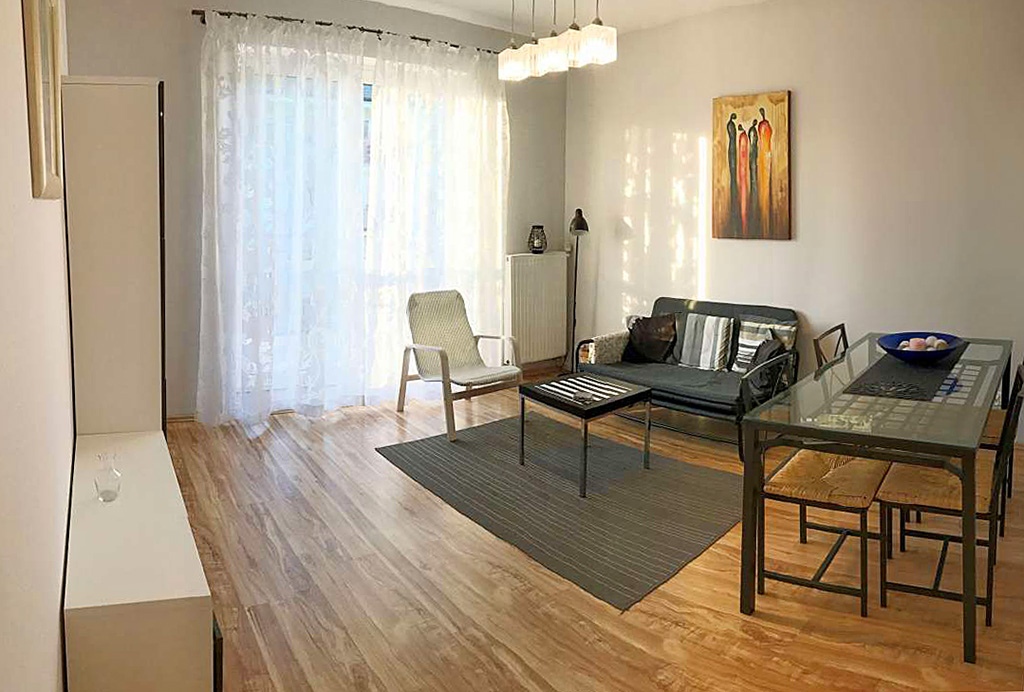 nowoczesne wnętrze luksusowego salonu w ekskluzywnym apartamencie do sprzedaży w Szczecinie