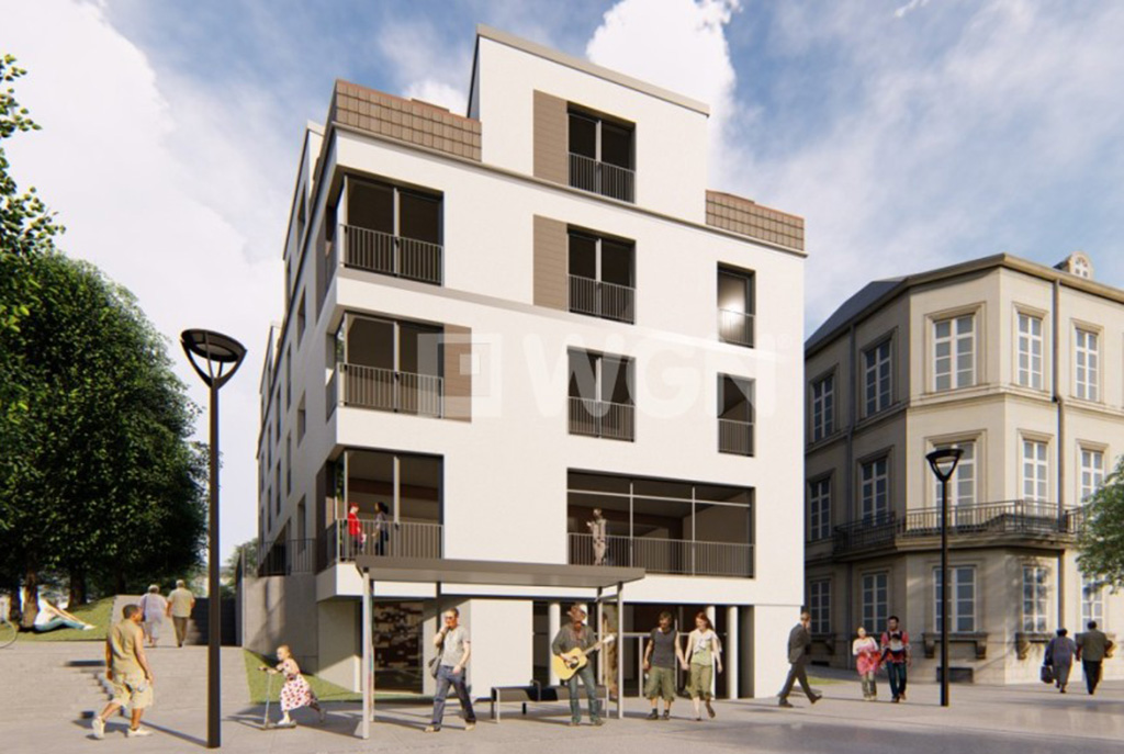 widok z ulicy przedstawiający nowoczesny apartamentowiec w Kwidzynie, w którym mieści się ekskluzywny apartament na sprzedaż