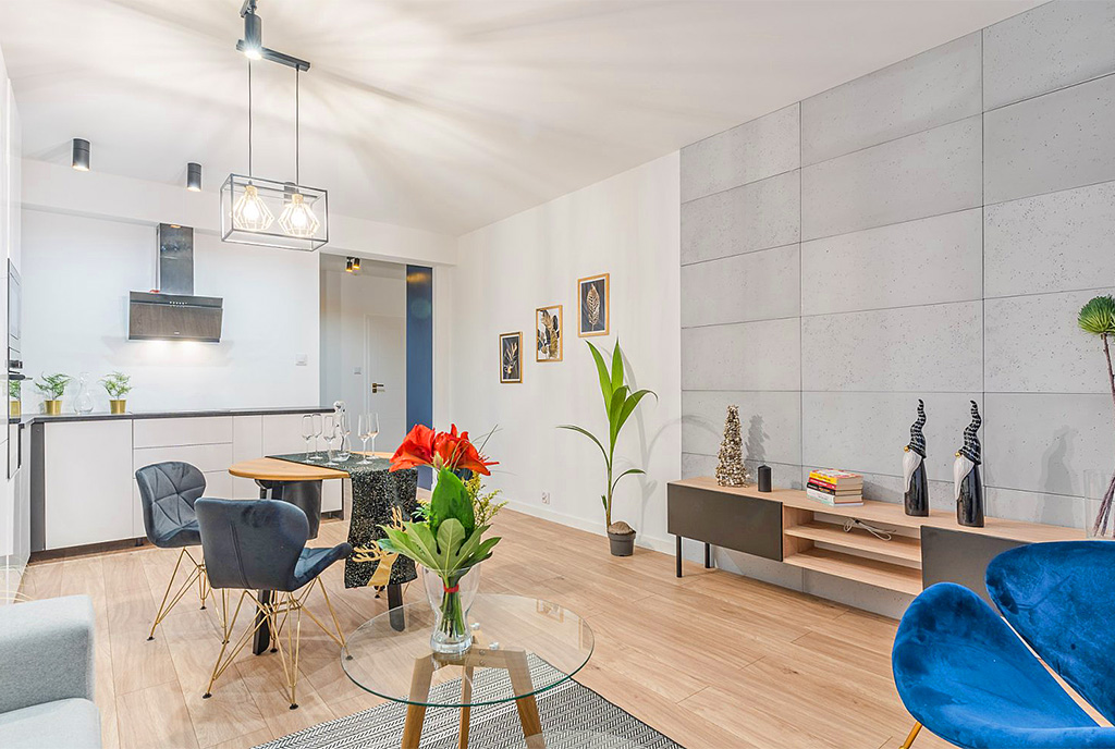 zaprojektowany w nowoczesnym designie pokój dzienny w ekskluzywnym apartamencie do sprzedaży Gdańsk