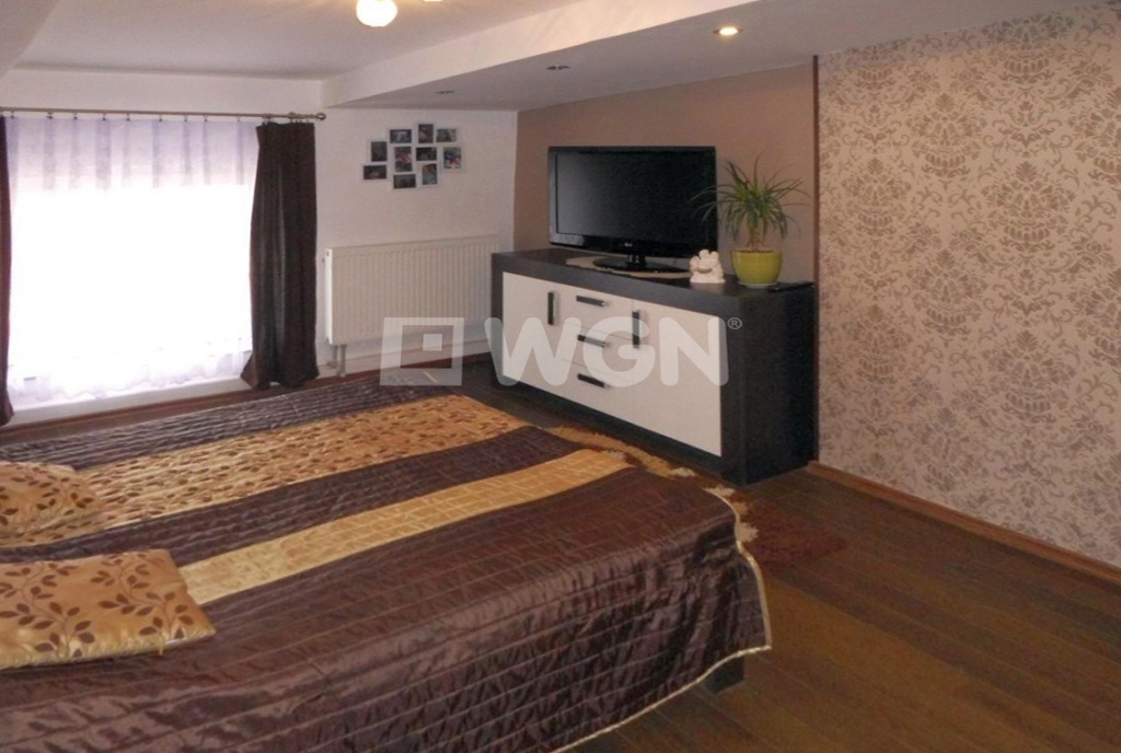 widok na stylową sypialnię w luksusowej willi w Częstochowie na sprzedaż