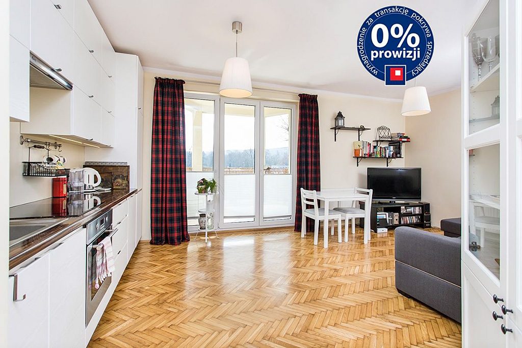 wejście do ekskluzywnego salonu w luksusowym apartamencie do sprzedaży w Krakowie