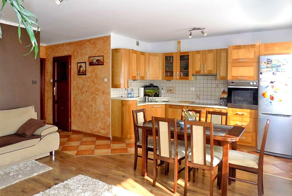 komfortowa kuchnia w ekskluzywnym apartamencie do sprzedaży w Ełku