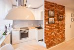 zbliżenie na kuchnię w luksusowym apartamencie w Kaliszu na sprzedaż