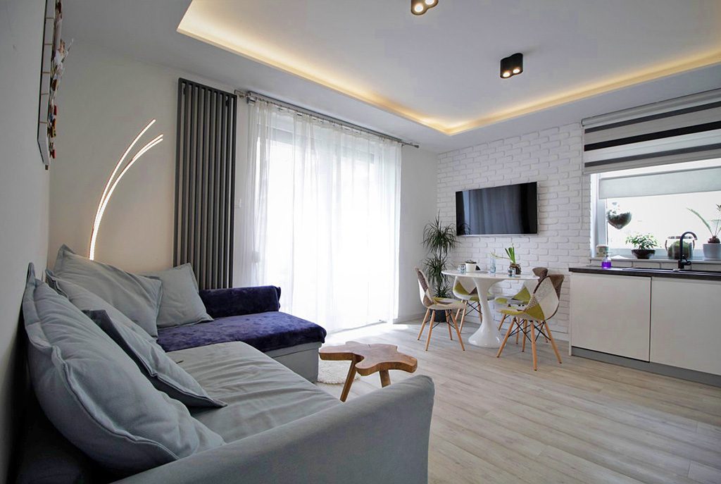 nowoczesny salon w ekskluzywnym apartamencie do sprzedaży w Krakowie