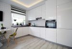 fragment komfortowej kuchni w luksusowym apartamencie do sprzedaży w Krakowie