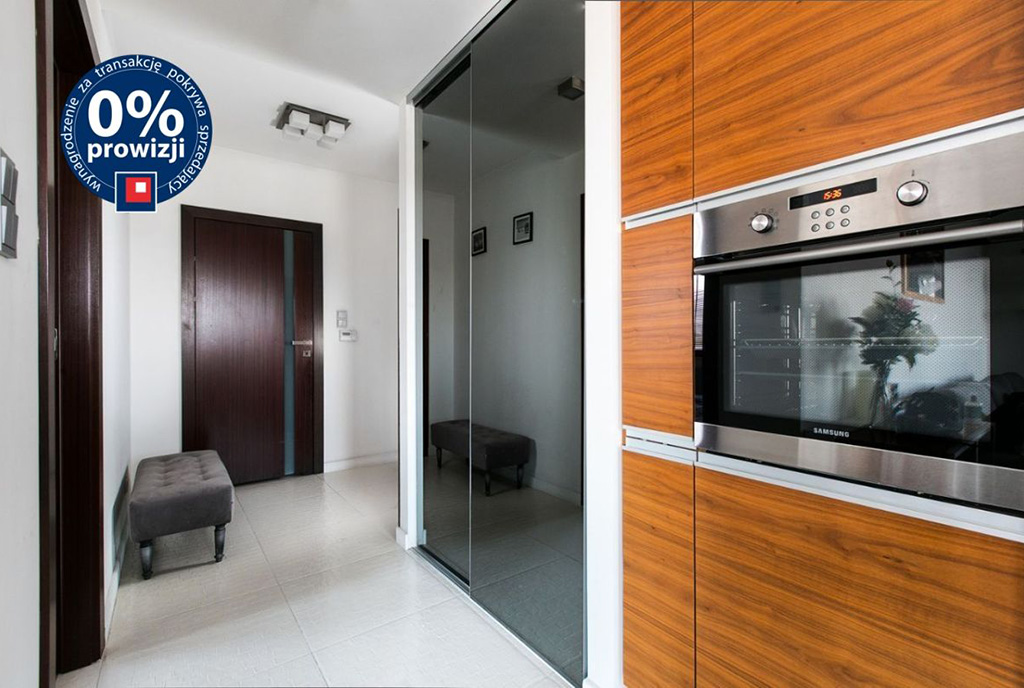 umeblowana w zabudowie kuchnia w luksusowym apartamencie w Krakowie na sprzedaż