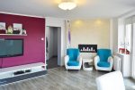 nowoczesny salon w ekskluzywnym apartamencie do sprzedaży w Pile