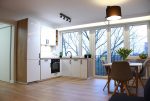 widok na komfortowy salon w luksusowym apartamencie do sprzedaży w Szczecinie