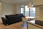 nowoczesny salon w ekskluzywnym apartamencie do sprzedaży w Szczecinie