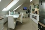 komfortowy salon w ekskluzywnym apartamencie do sprzedaży w Szczecinie