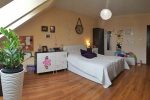 widok na elegancką sypialnię w luksusowym apartamencie do sprzedaży w Szczecinie