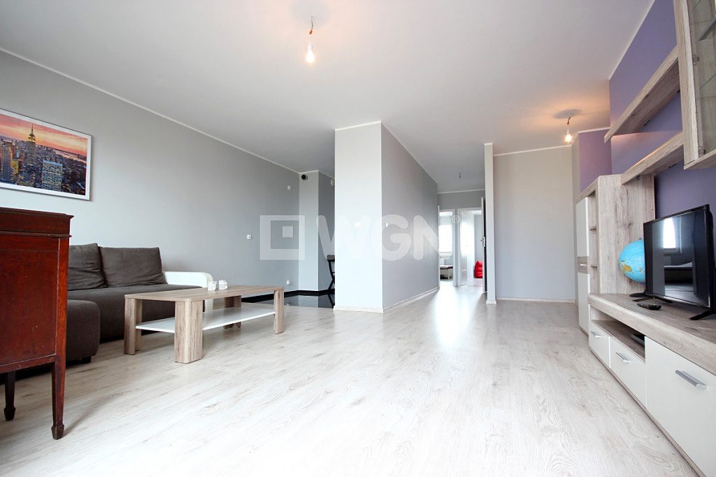 przestronny salon w ekskluzywnym apartamencie do sprzedaży w Szczecinie