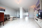 przestronny salon w ekskluzywnym apartamencie do sprzedaży w Szczecinie