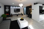 nowoczesny salon w ekskluzywnym apartamencie do sprzedaży w okolicach Legnicy