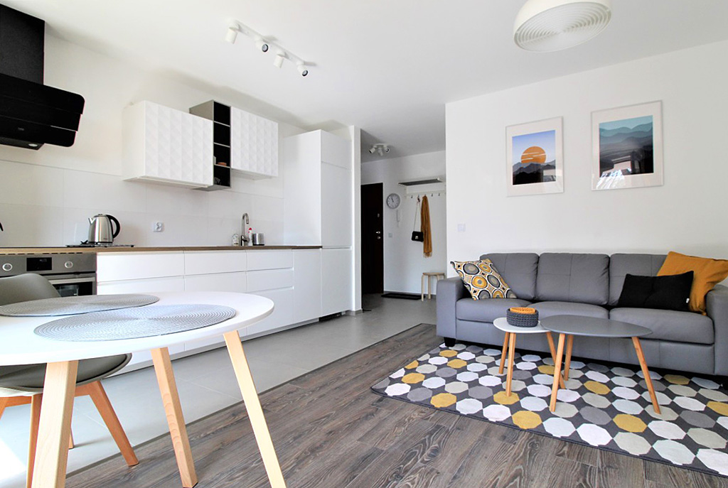 nowocześnie zaprojektowana przestrzeń ekskluzywnego apartamentu do wynajmu w Krakowie