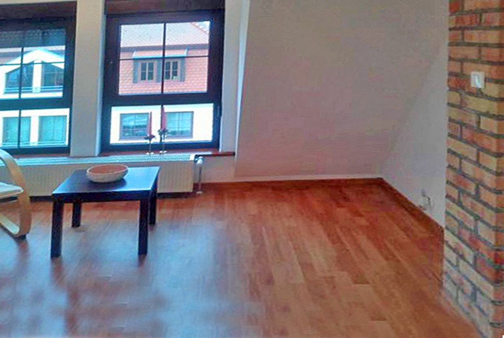 jeden z komfortowych pokoi w ekskluzywnym apartamencie do wynajmu w Szczecinie