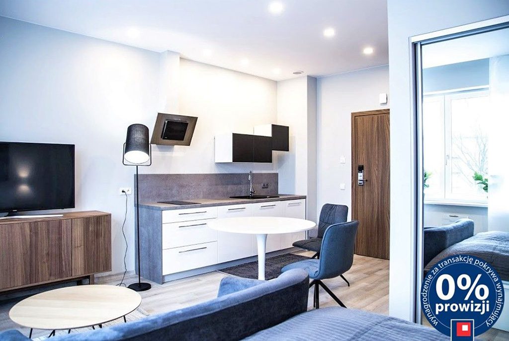 aneks kuchenny w nowoczesnym designie w ekskluzywnym apartamencie do wynajęcia w Krakowie