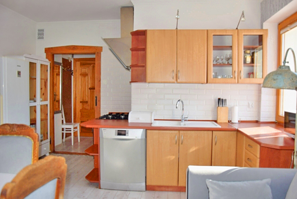 stylowa kuchnia w luksusowym apartamencie do wynajmu w Słupsku