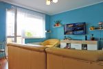 nowoczesny salon w ekskluzywnym apartamencie do sprzedaży na Mazurach
