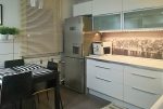 nowoczesny aneks kuchenny w ekskluzywnym apartamencie do sprzedaży w Kaliszu