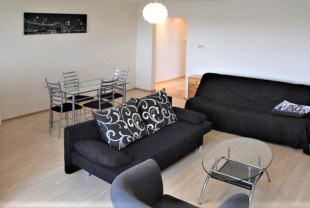 widok z innej perspektywy na luksusowy salon w ekskluzywnym apartamencie do sprzedaży w Szczecinie