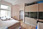 zdjęcie prezentuje elegancką sypialnię w luksusowym apartamencie w Szczecinie na sprzedaż