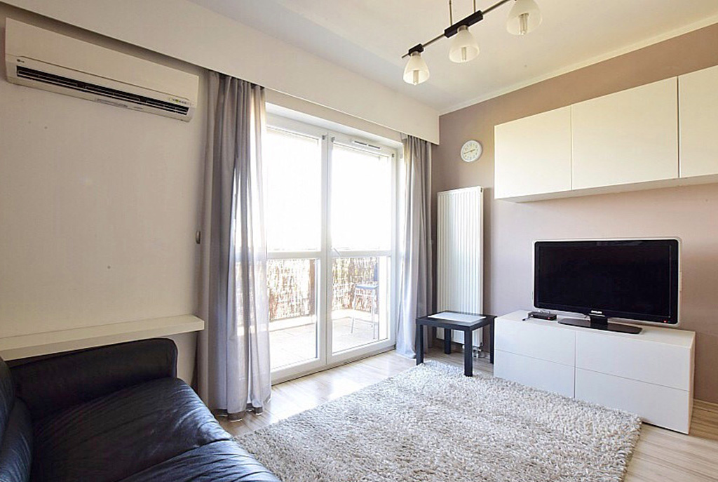 komfortowy salon w ekskluzywnym apartamencie do wynajęcia w Katowicach