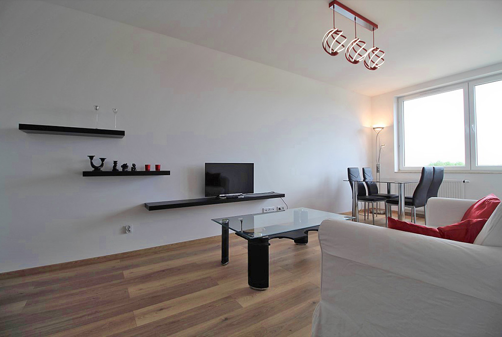 nowoczesny salon w ekskluzywnym apartamencie do wynajęcia w Krakowie
