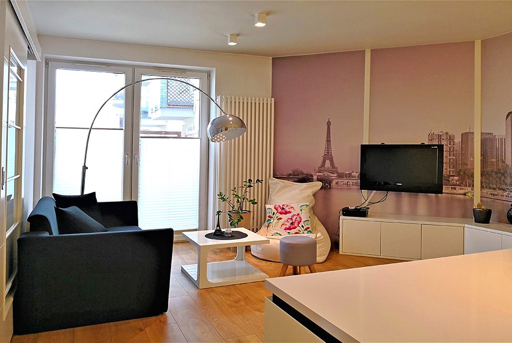 nowoczesny salon w ekskluzywnym apartamencie do wynajęcia w Krakowie