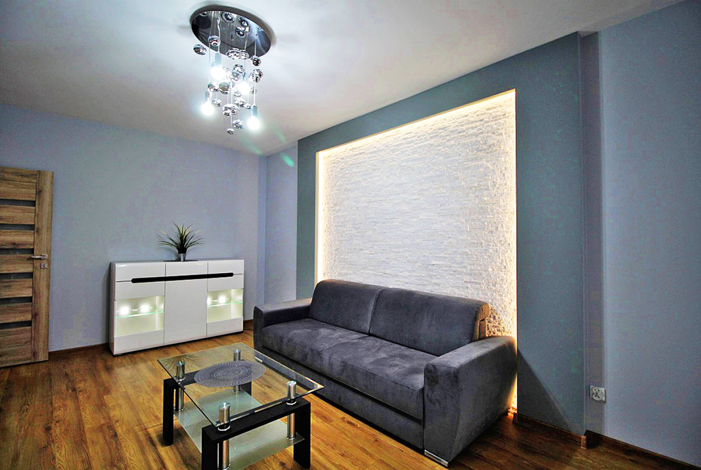 wytworny salon w ekskluzywnym apartamencie do wynajęcia w Krakowie