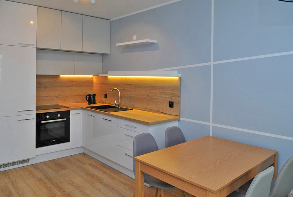 nowoczesna, umeblowana kuchnia w luksusowym apartamencie w Szczecinie na sprzedaż