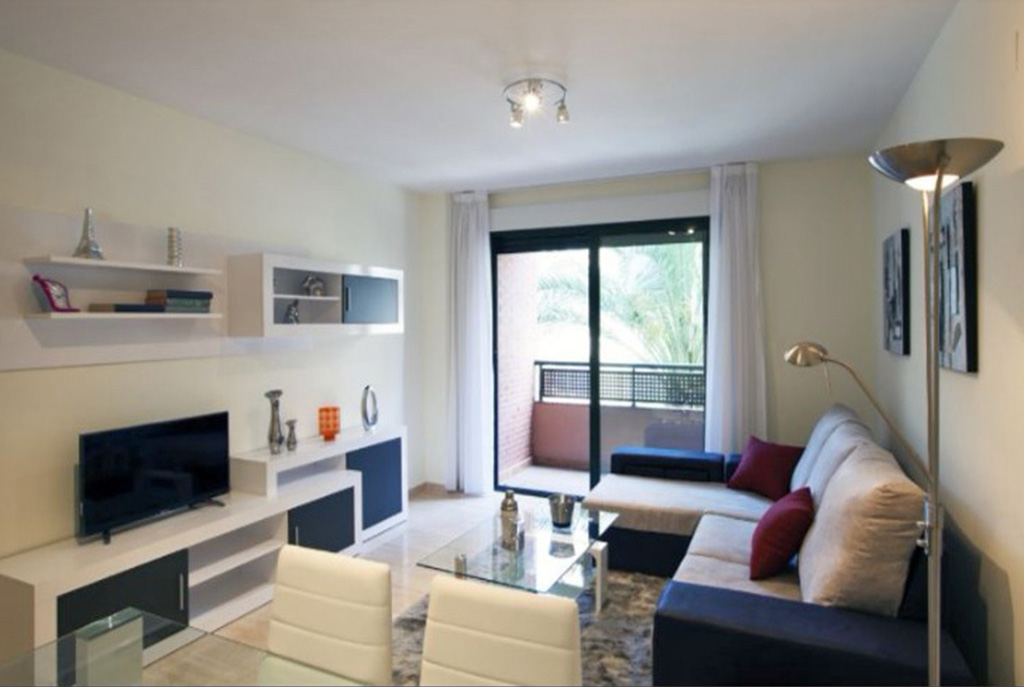 nowoczesny salon w ekskluzywnym apartamencie do sprzedaży w Hiszpanii