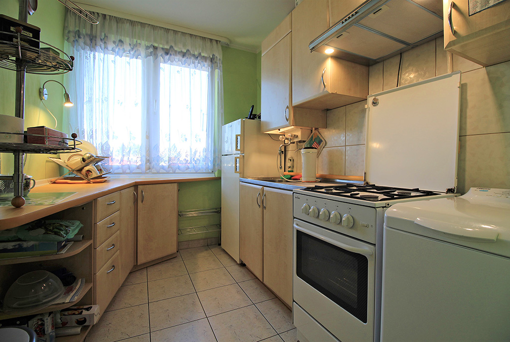 urządzona kuchnia w luksusowym apartamencie w Krakowie na sprzedaż