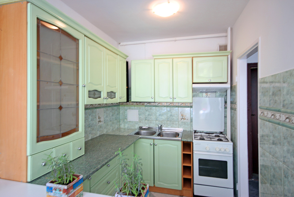 stylowy aneks kuchenny w luksusowym apartamencie w Szczecinie na sprzedaż