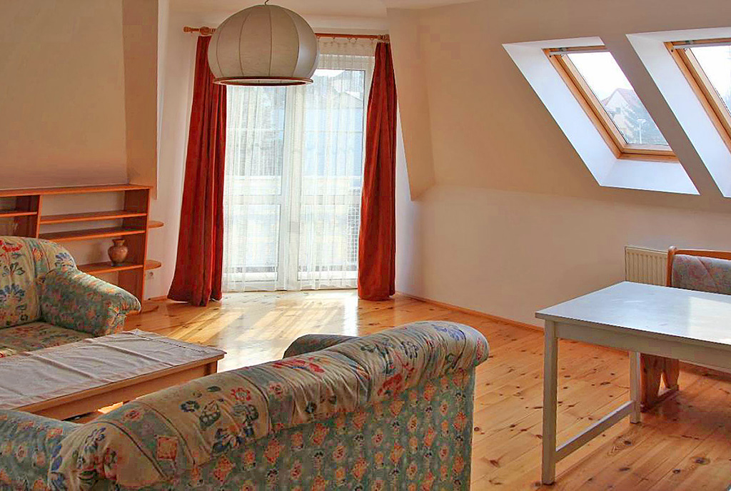 n zdjęćiu salon w ekskluzywnym apartamencie w Szczecinie na sprzedaż
