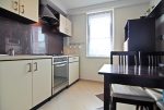 umeblowana kuchnia w luksusowym apartamencie do sprzedaży w Wieluniu