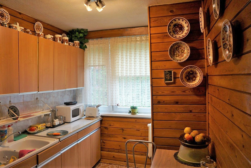 komfortowa kuchnia w luksusowym apartamencie do sprzedaży we Wrocławiu