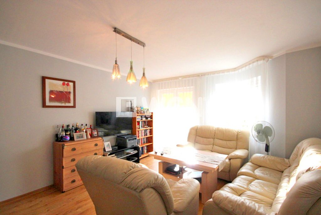 nowoczesny salon w ekskluzywnym apartamencie do sprzedaży w Szczecinie