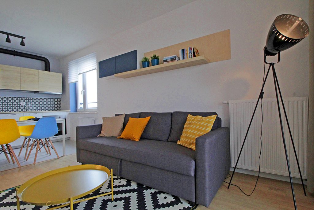 nowoczesny salon w ekskluzywnym apartamencie do wynajmu w Krakowie