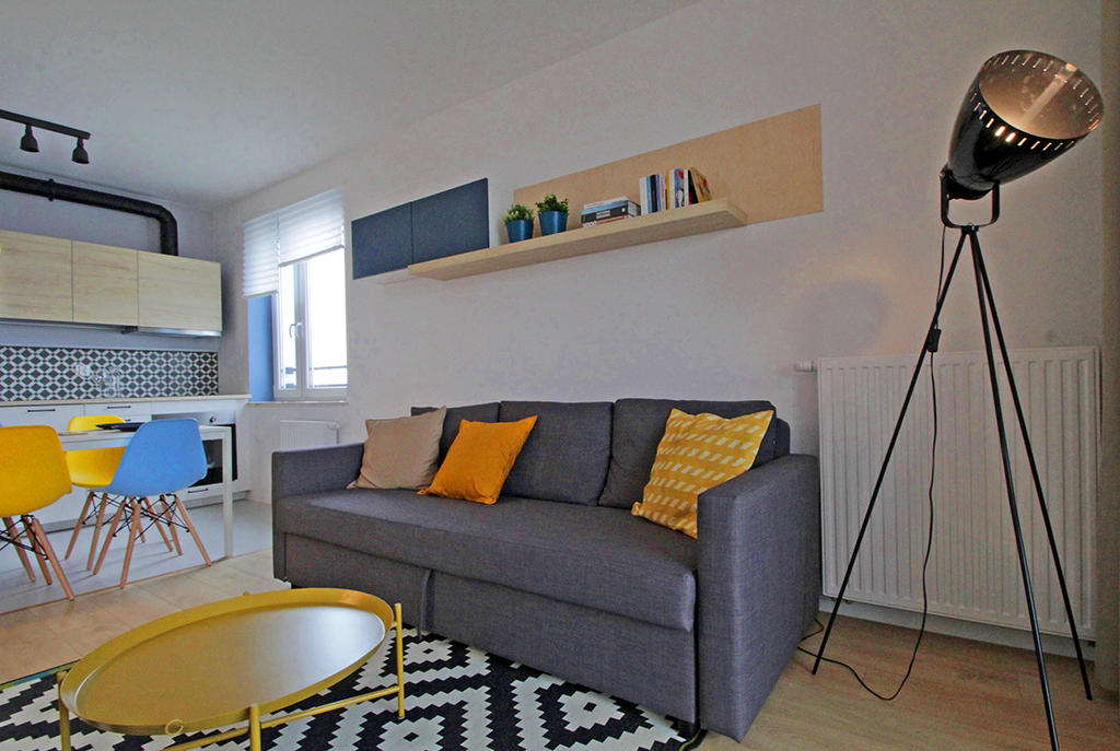 nowoczesny salon w ekskluzywnym apartamencie do wynajmu w Krakowie