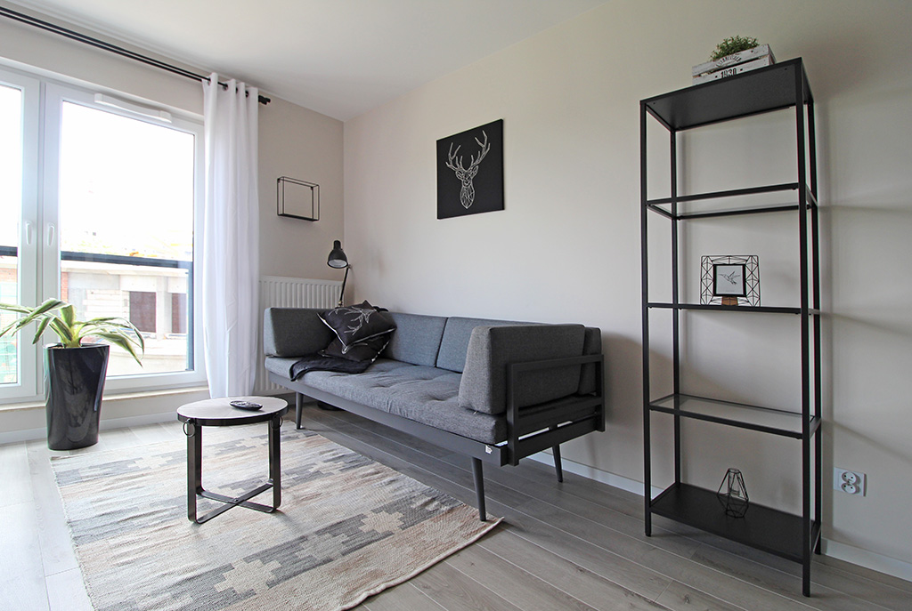 ekskluzywny salon w luksusowym apartamencie do wynajęcia w Krakowie