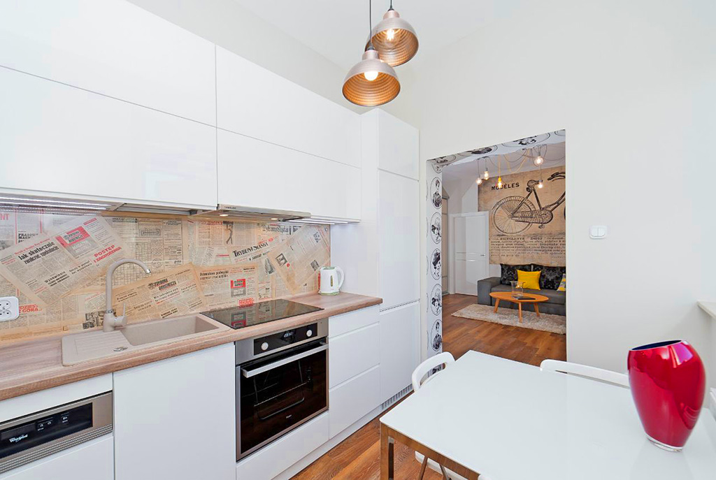 widok na wyposażoną, umeblowaną kuchnię w luksusowym apartamencie w Krakowie na wynajem