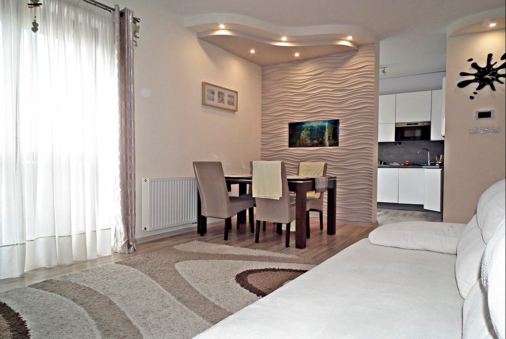 umeblowany w nowoczesnym designie salon w ekskluzywnym apartamencie do sprzedaży w Legnicy