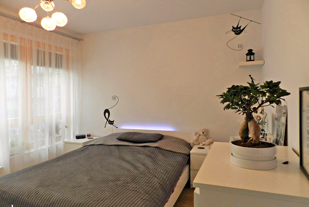 widok na cichą i elegancką sypialnię w luksusowym apartamencie w Szczecinie na wynajem