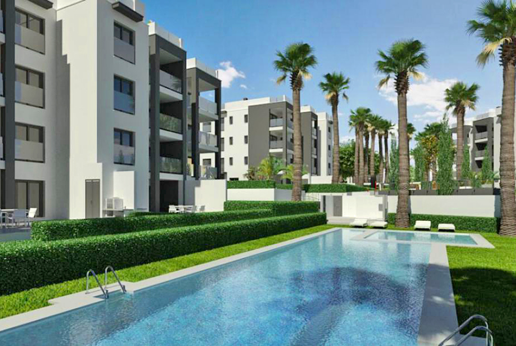 zdjęcie prezentuje osiedle z basenem w Hiszpanii (Orihuela Costa), gdzie mieści się oferowany na sprzedaż luksusowy apartament