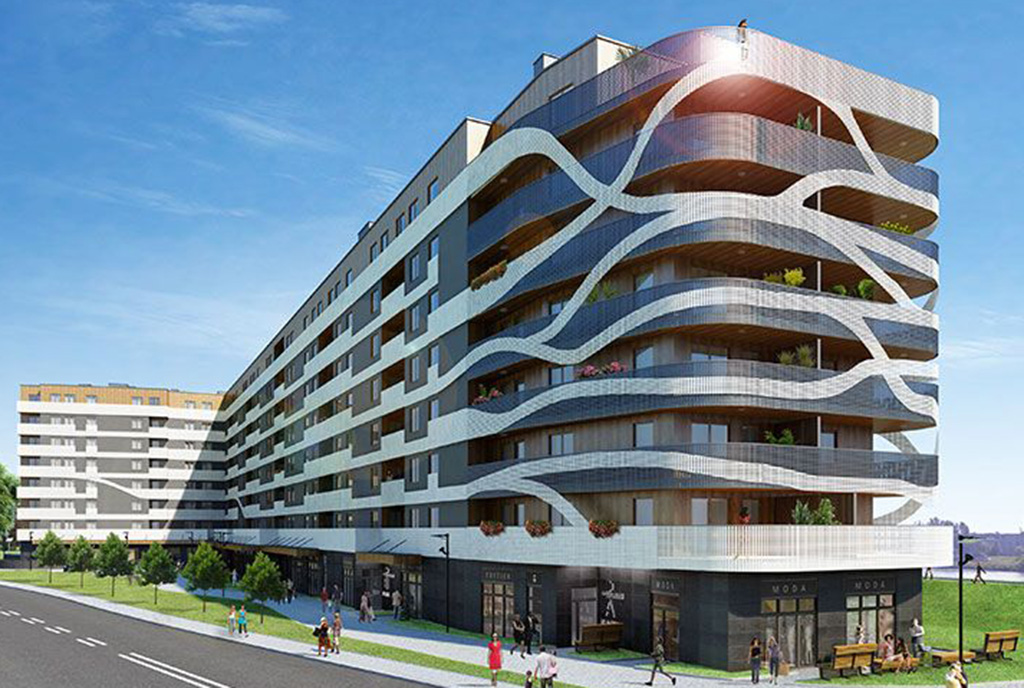 widok od strony ulicy na luksusowy apartamentowiec w Krakowie, w którym znajduje się ekskluzywny apartament do sprzedaży