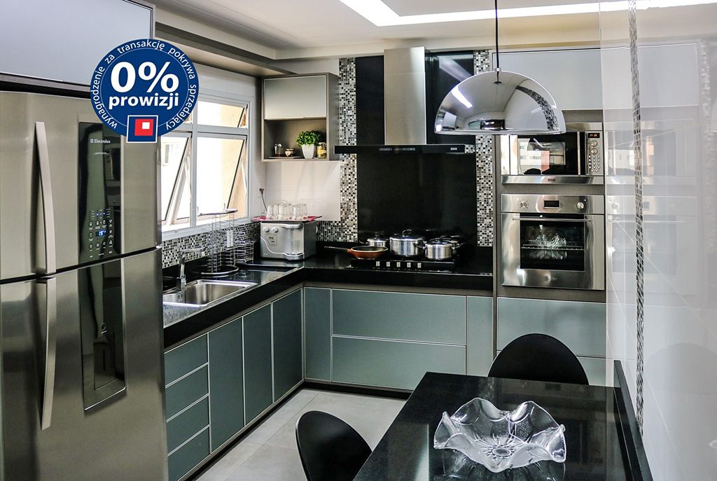 nowocześnie umeblowana kuchnia w luksusowym apartamencie do sprzedaży w Krakowie