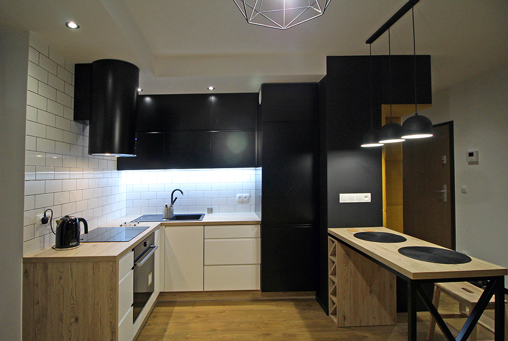 komfortowa kuchnia w ekskluzywnym apartamencie do wynajmu w Krakowie