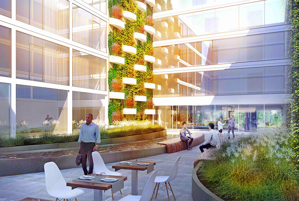 widok od strony ulicy na elitarny apartamentowiec nad morzem, w którym położony jest luksusowy apartament do sprzedaży