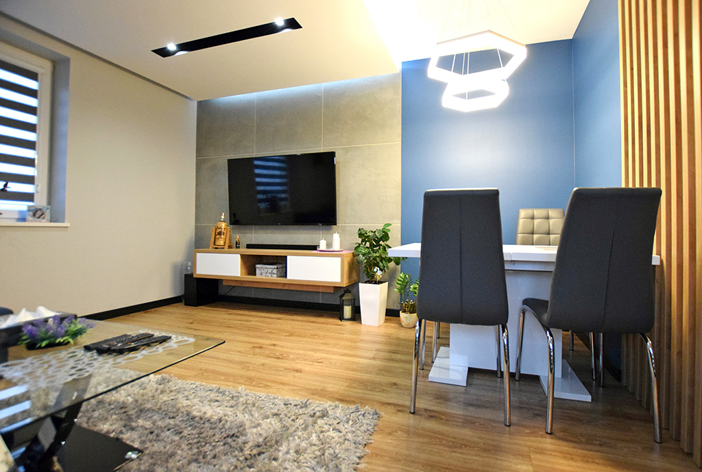 prestiżowy salon z oryginalnym oświetleniem w ekskliuzywnym apartamencie do sprzedaży Białystok